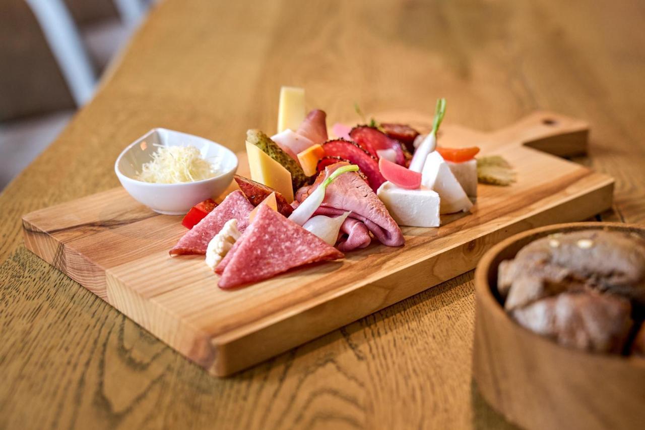 A-Rosa Ifen Hotel Kleinwalsertal Hirschegg  Exteriör bild A selection of cured meats and cheese